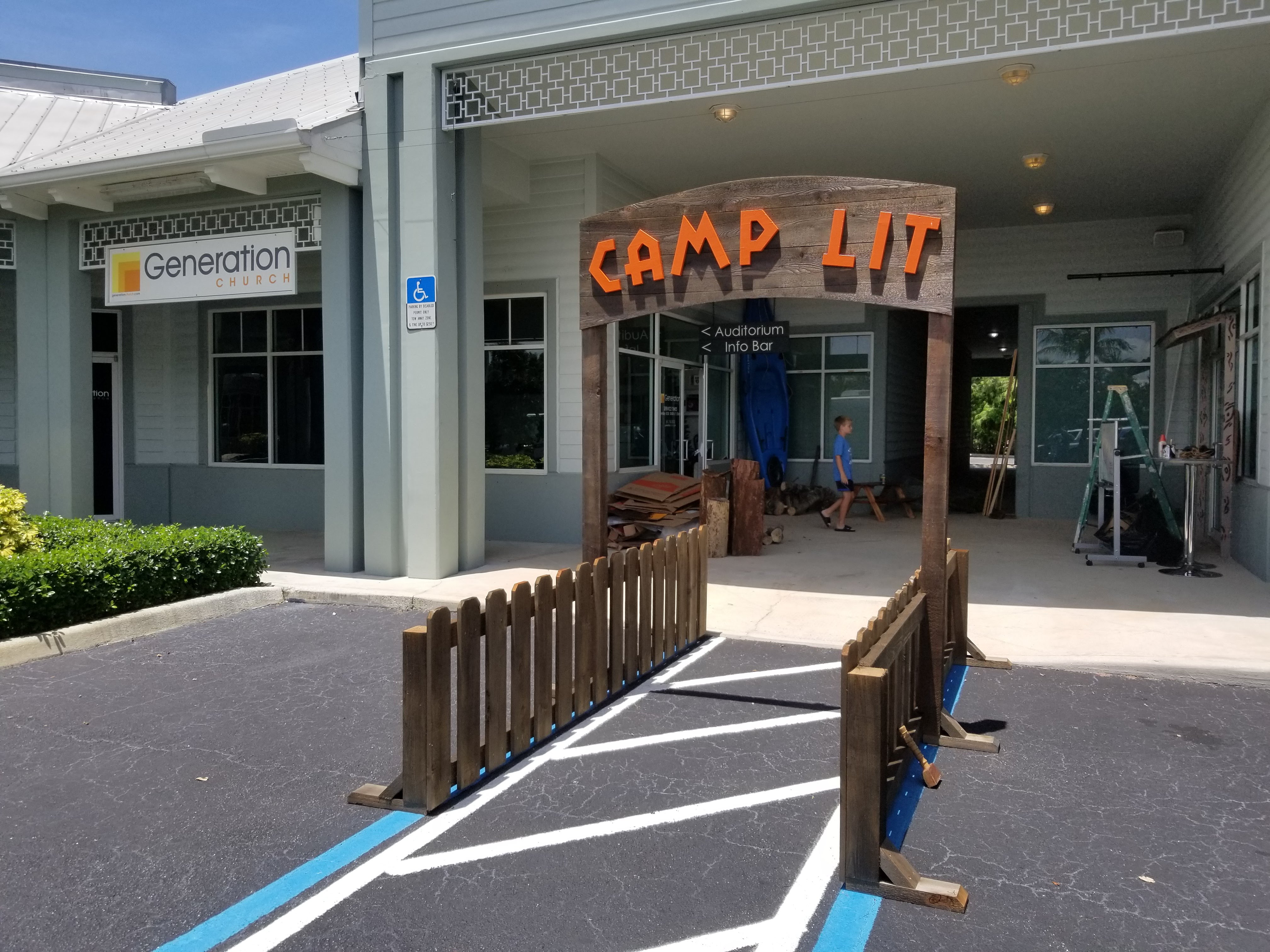 The camp lit entry sign is set up and on display